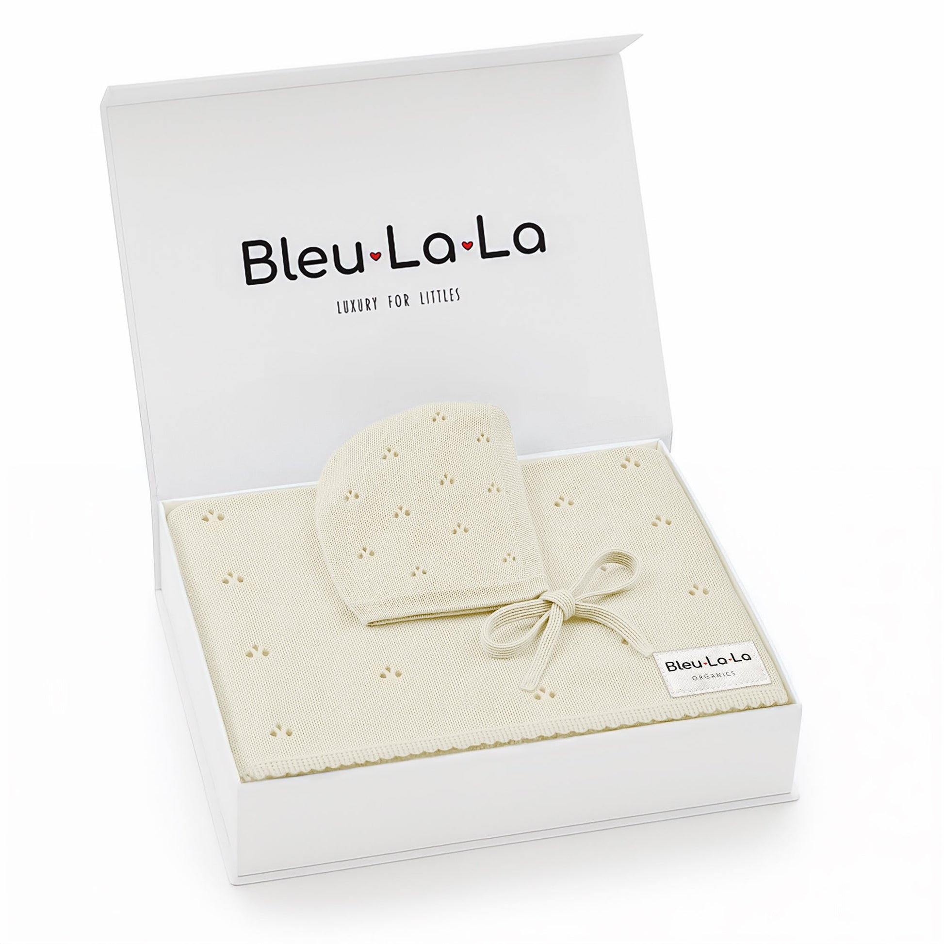 Baby hat and blanket set in a 'Bleu La La' box on a white background