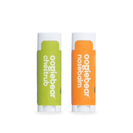 Close-up of oogiebear organic nose balm and chest rub showing mess-free tube design on white background.