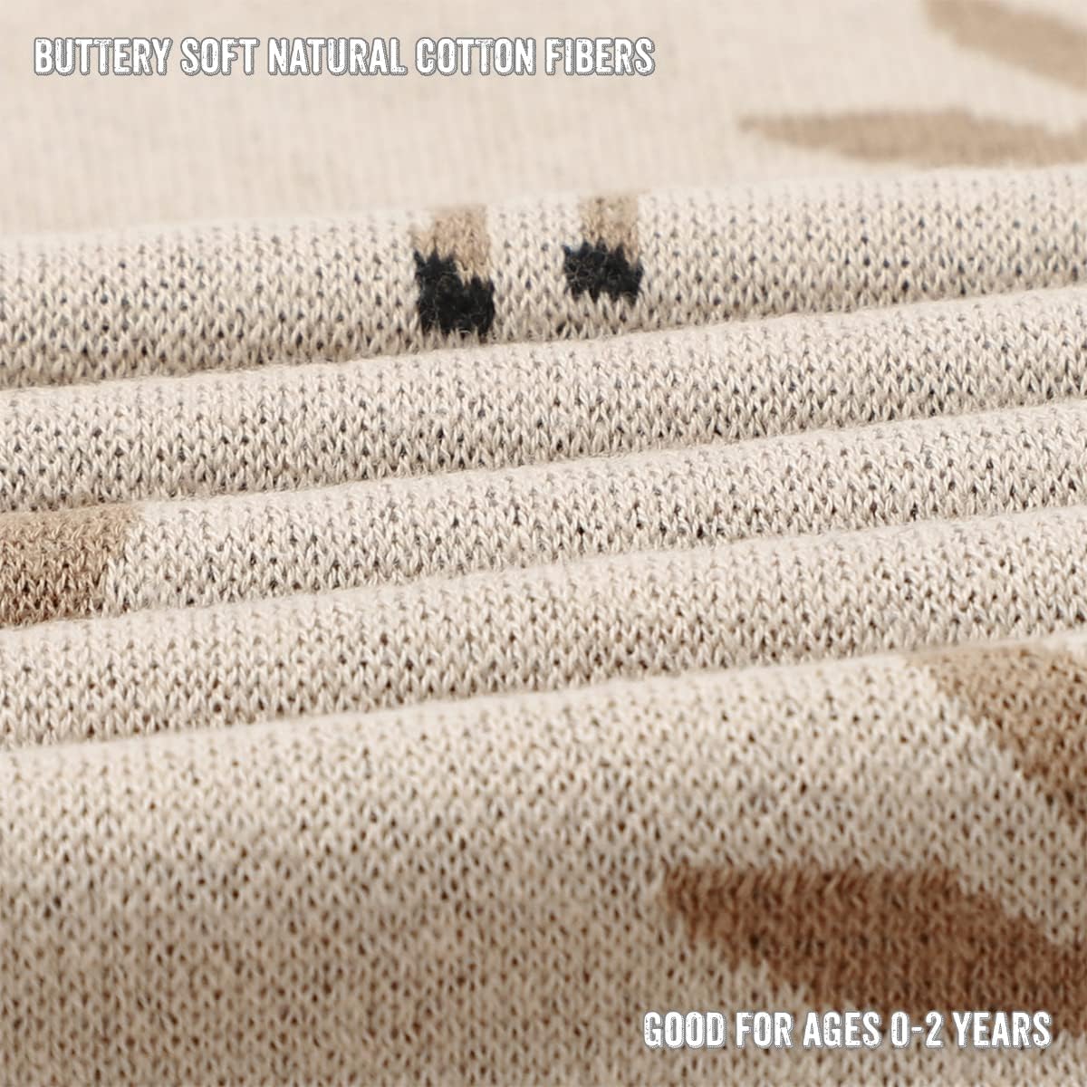 Close-up of beige fabric with specks of black and brown, labeled 'Buttery soft natural cotton fibers' and 'Good for ages 0-2 years'.