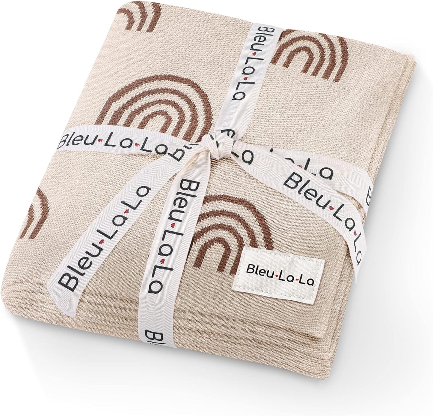Folded fabric with rainbow patterns and 'Bleu La La' branding on a white background