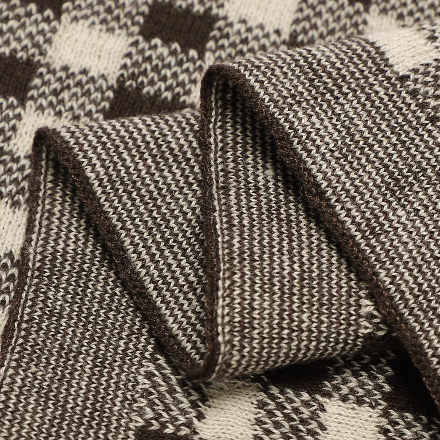 Close-up of a textured brown and beige fabric with a pattern