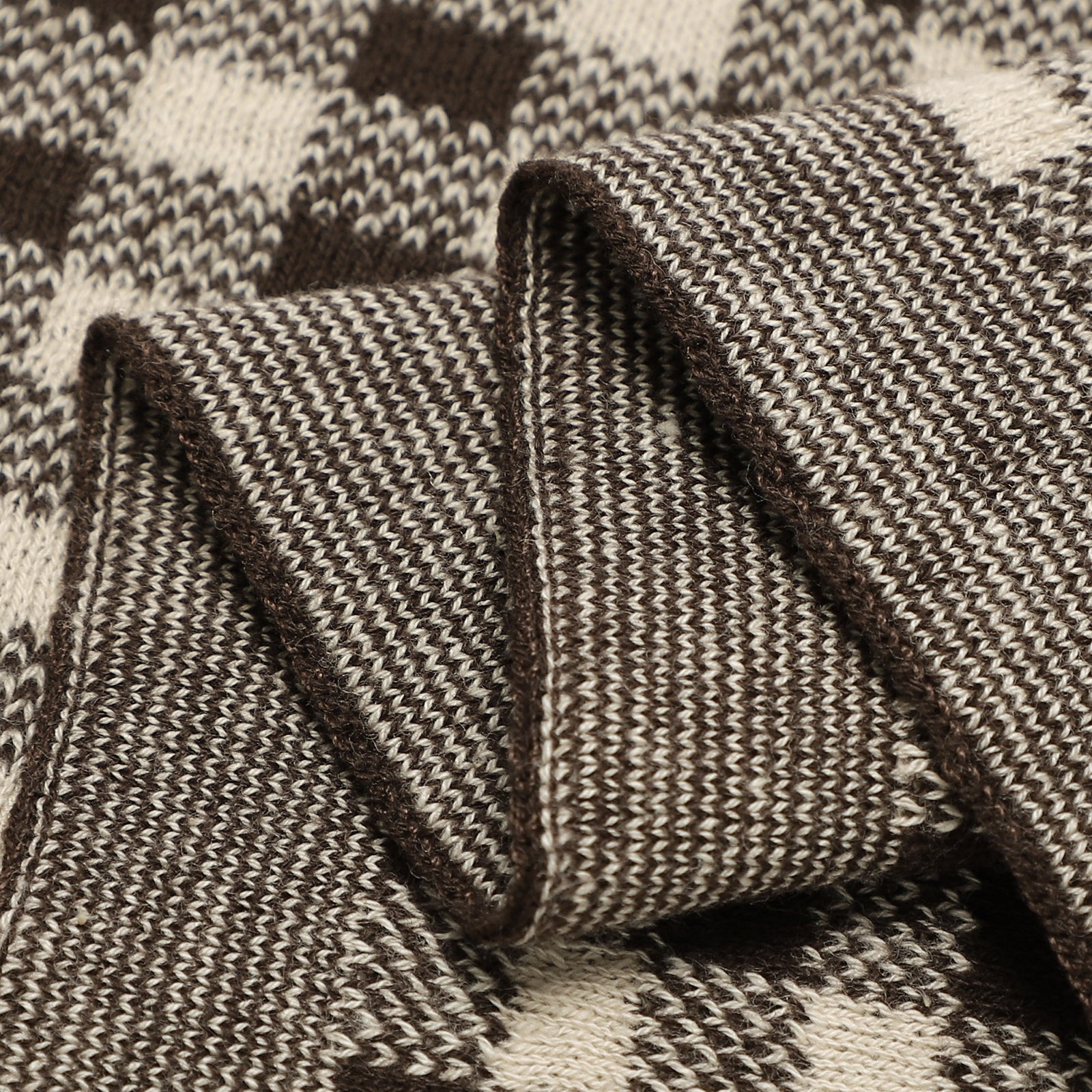 Close-up of a textured brown and beige fabric with a pattern