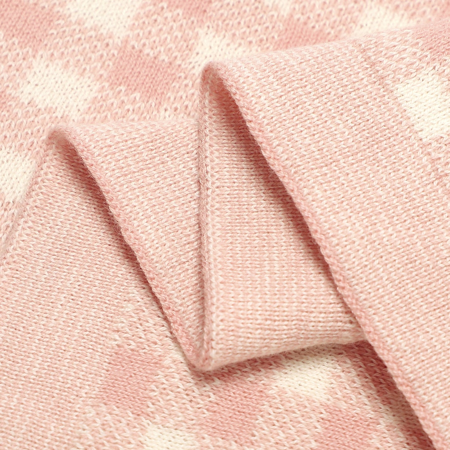 Close-up of pink fabric with a soft texture