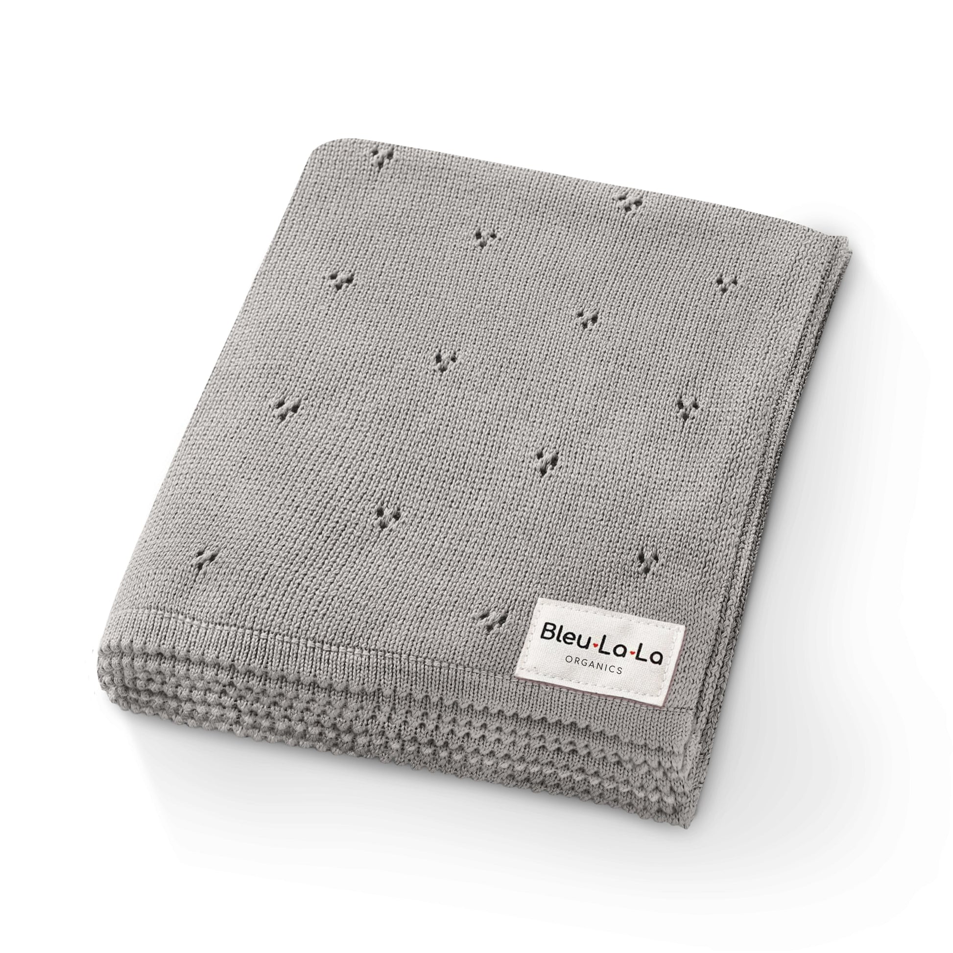 Gray 'Bleu La La'  knit blanket with small patterns and a visible brand label on a white background