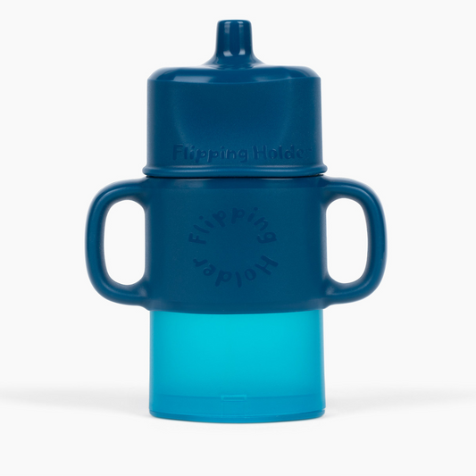 Blue sippy cup with handle on a white background
