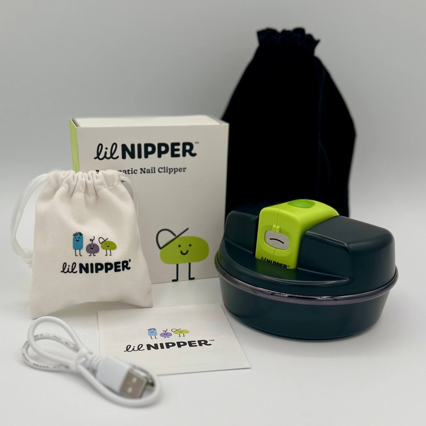 Contents: POD, Lil Nipper device, carrying bags for both devices, charging cable, instruction manual