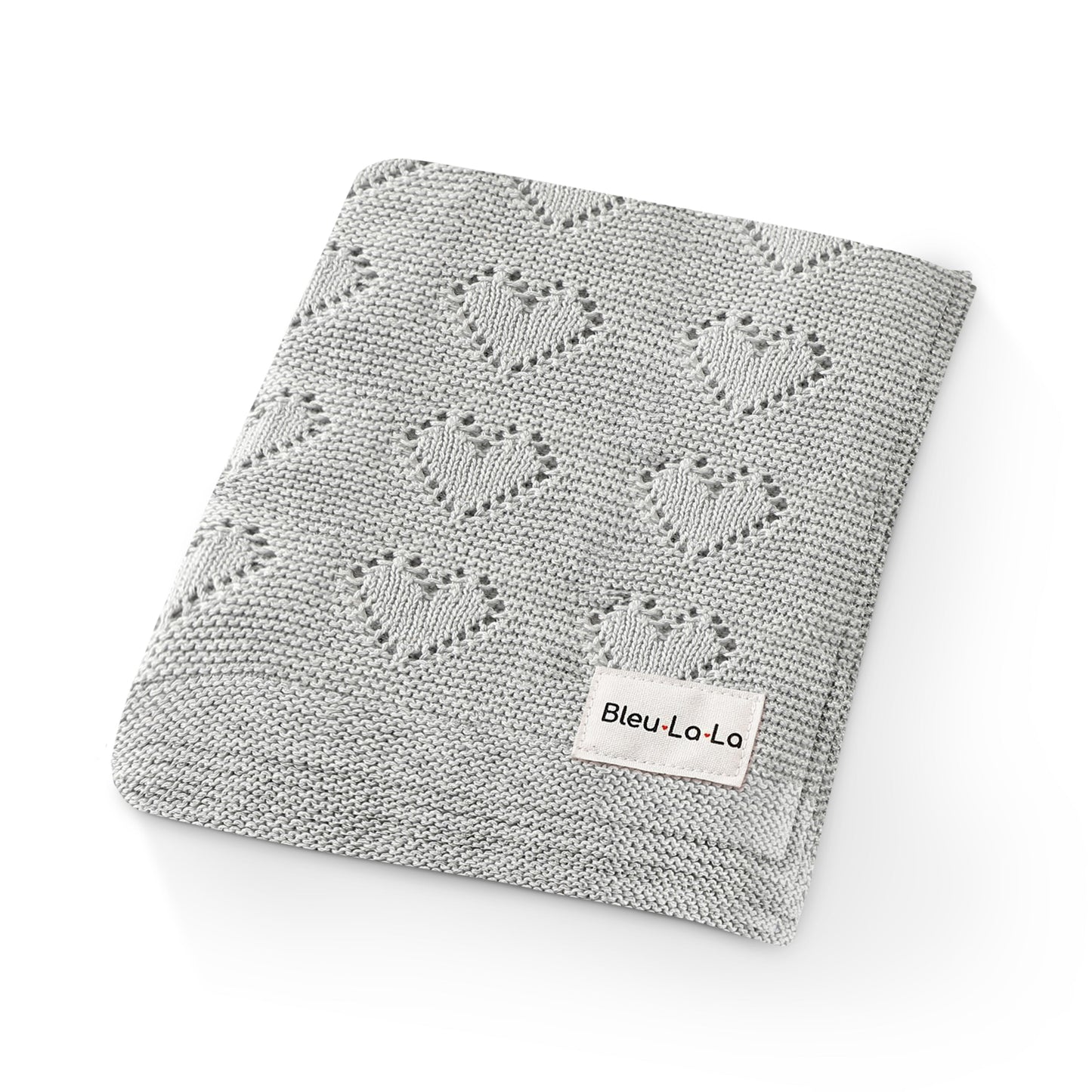 Gray knitted blanket with heart patterns and a visible Bleu-la-la  label on a white background