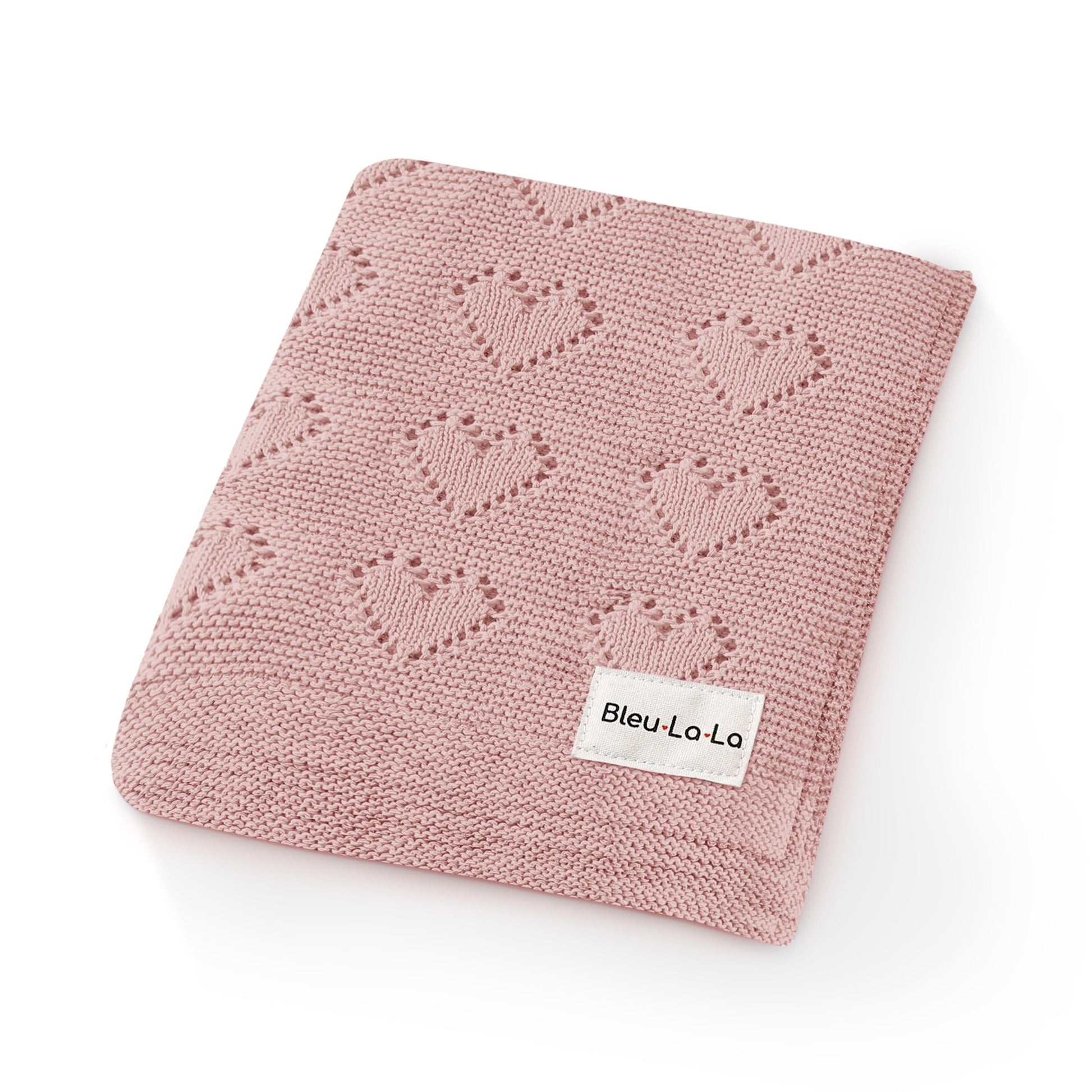 Pink knitted blanket with heart patterns and Bleu La La label on a white background