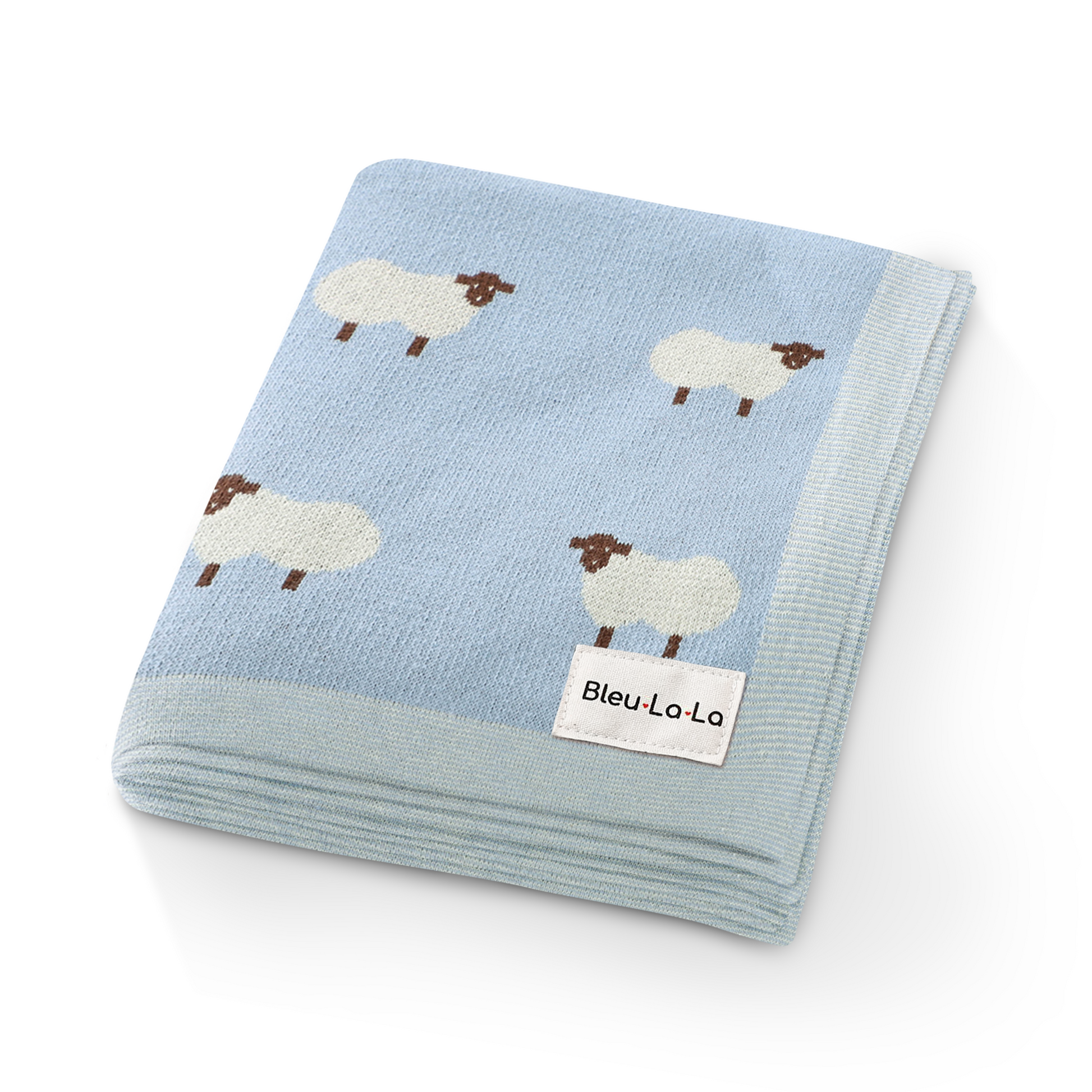 Folded blue blanket with sheep pattern and Bleu La La label on a white background
