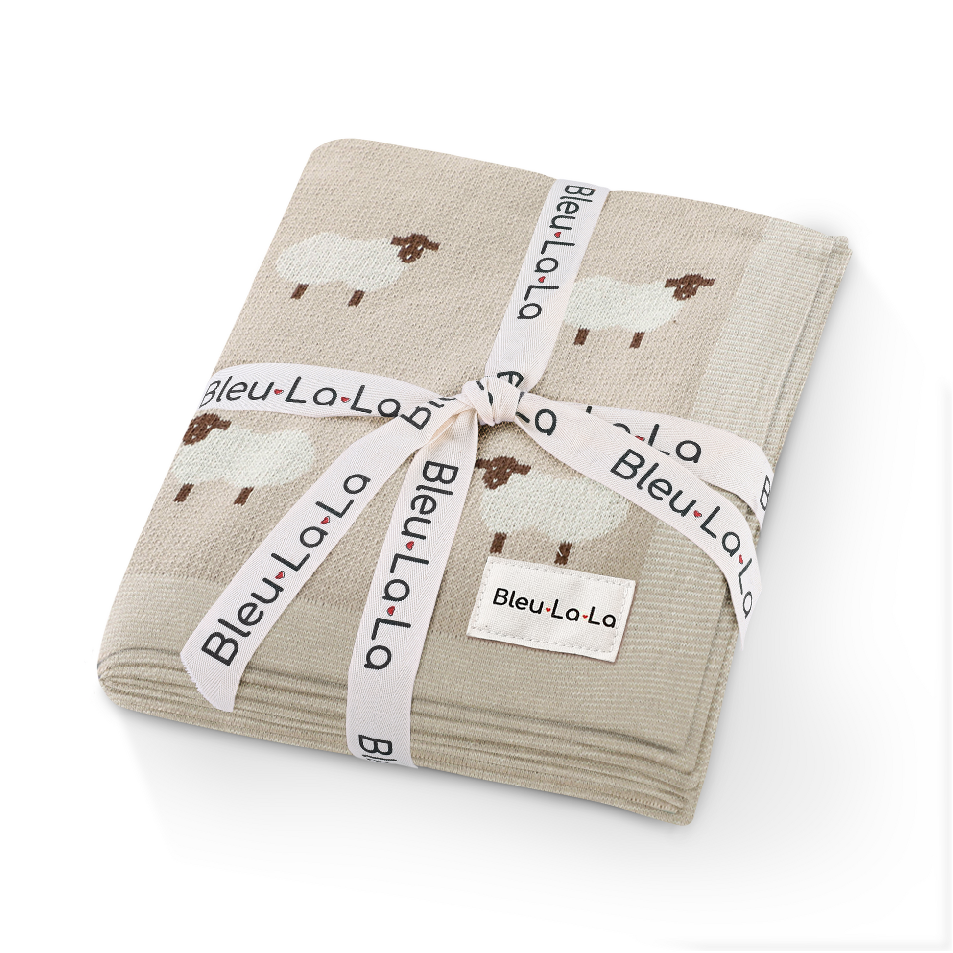 Folded fabric with animal pattern and 'Bleu La La' branding on a white background
