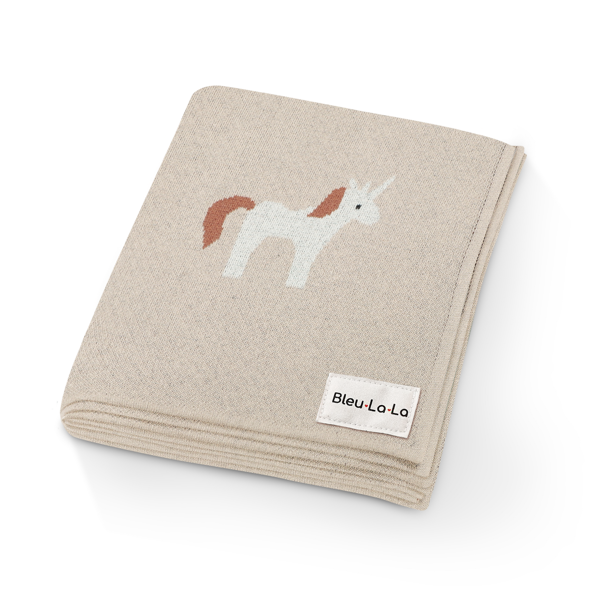 Beige blanket with unicorn design and Bleu Lo La label on a white background
