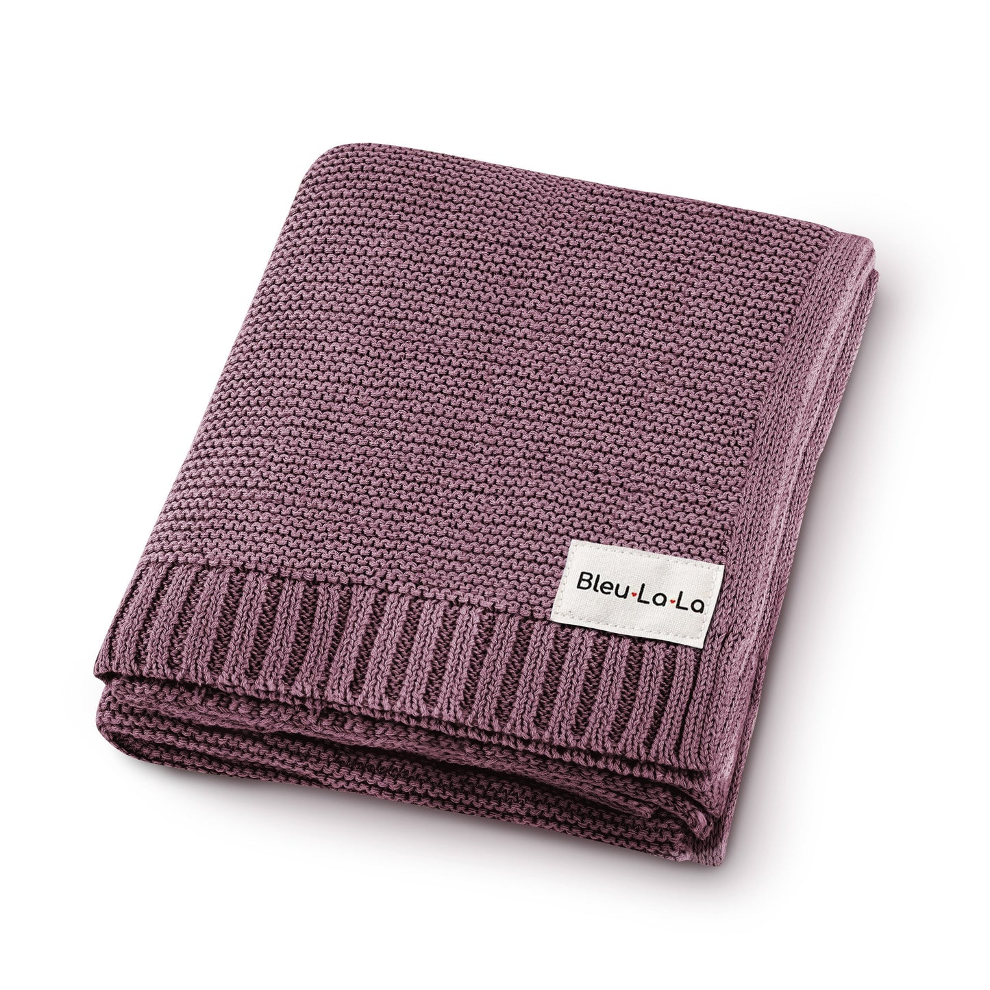 Folded purple blanket with a visible Blue-La-La label on a white background