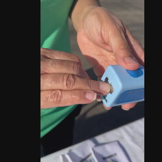 Video of a adult woman using the Lil Nipper Blue color. She is at a festival and really loves it. Big smiles!
