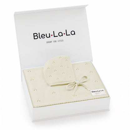 Baby hat and blanket set in a 'Bleu La La' box on a white background