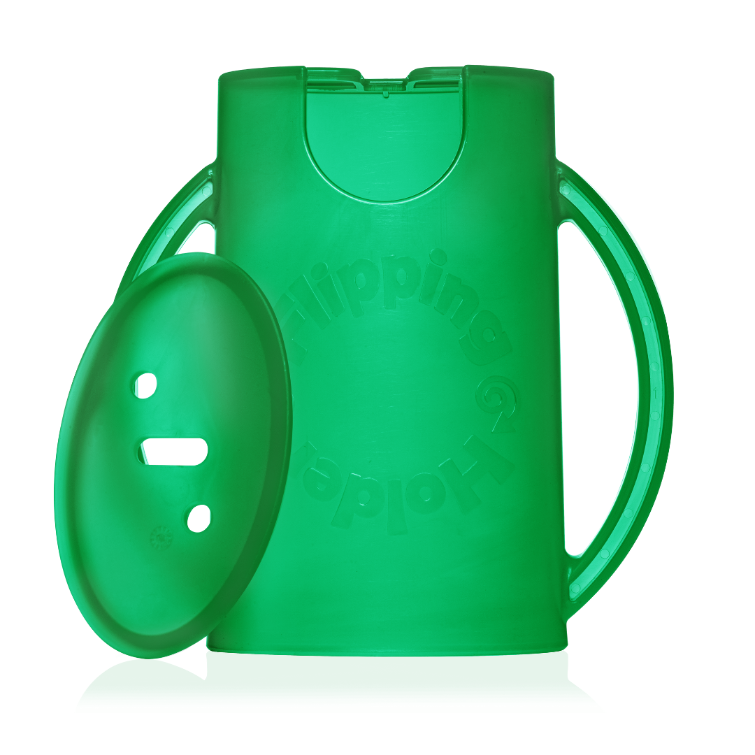 Green deluxe sippy cup with a lid on a white background