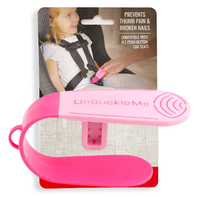 Pink 'UnbuckleMe' car seat safety device with packaging showing a child in a car seat.