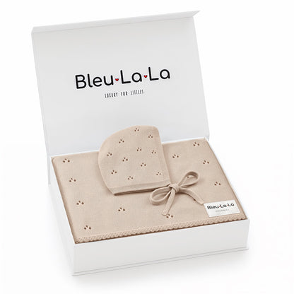 Baby hat and blanket set in a 'Bleu La La' box on a white background