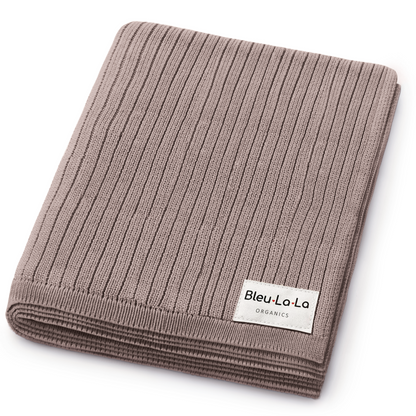Brown ribbed blanket with Bleu-La-La label on a white background