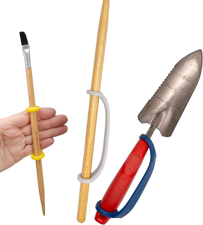 Set of gardening tools including a trowel, pruner, and brush with EazyHold grip handles on a white background
