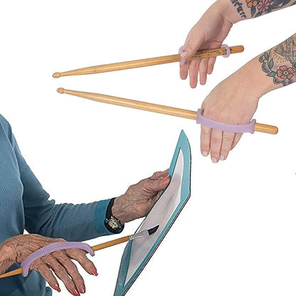 Two pairs of hands holding drumsticks with EaZyHold grip handles and another set of hands holding drumsticks..