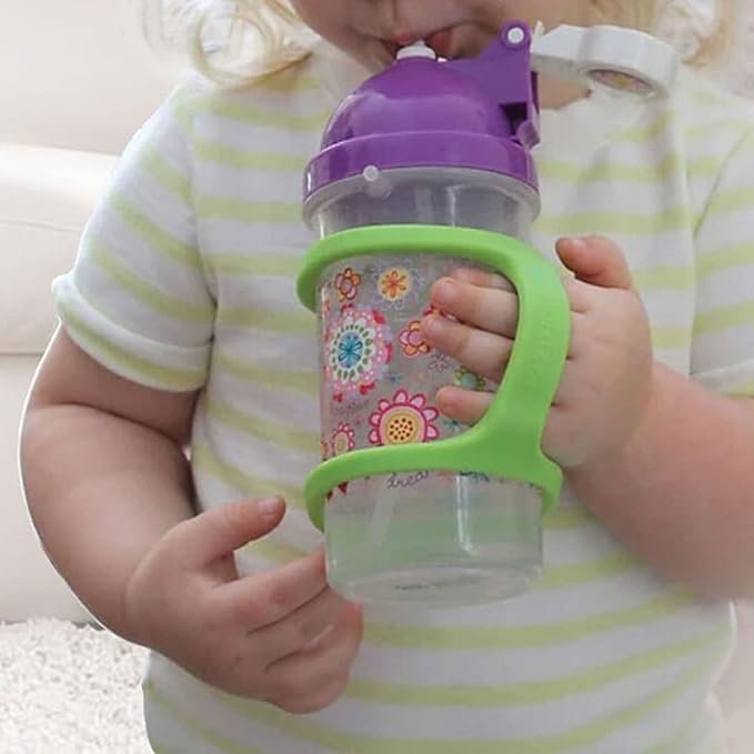 Child holding a colorful sippy cup with EaZyHold grips