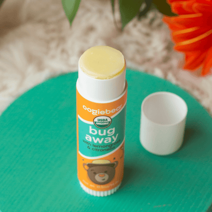 
oogiebear Bug Away Balm 0.5 oz tube with mess-free applicator design, cap off. 