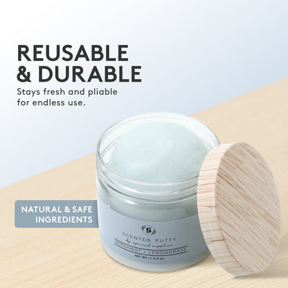 Jar of scented putty with wooden lid on a light surface, text highlighting features. Natural and safe ingredients, reusable ad durable. Stays fresh and pliable for endless use.