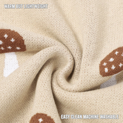 Close-up of beige fabric with mushroom patterns and text indicating warmth, light weight, and machine washability.