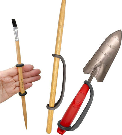 Set of gardening tools including a trowel, pruner, and brush with EazyHold grips handles.
